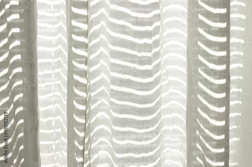 Wallpaper Mural White linen curtain with reflected lines of the sun as background. Selective focus. Defocus. Linen texture Torontodigital.ca