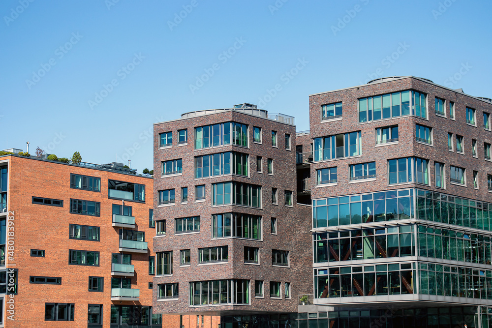 New building in Hamburg. residential area in the City. Modern architecture. Multi-story houses. Office Building. Rent an apartment. Real estate investment.