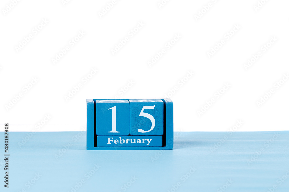 Wooden calendar February 15 on a white background Wooden calendar February 15 on a white background