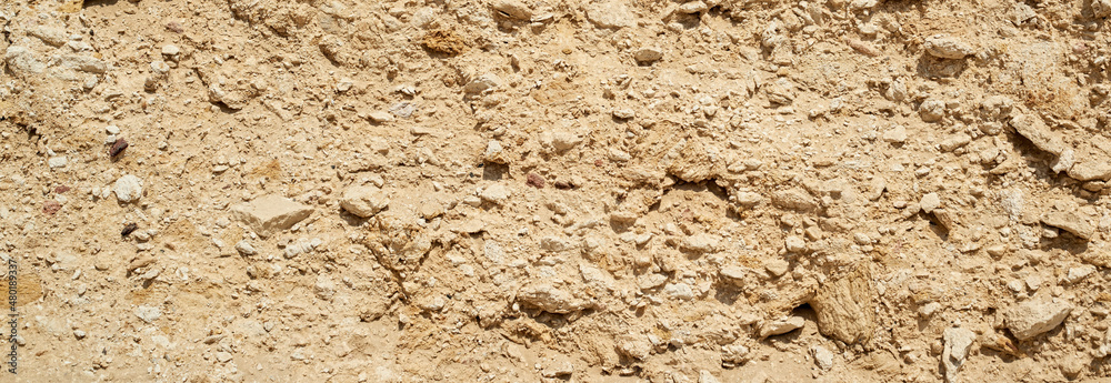 Natural texture sandstone, sun lighting, stone background Natural texture sandstone, sun lighting, stone background