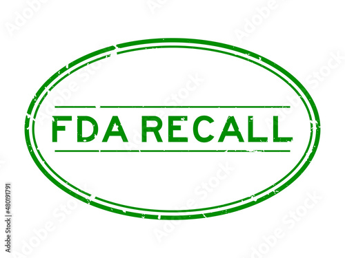Grunge green FDA recall word oval rubber seal stamp on white background