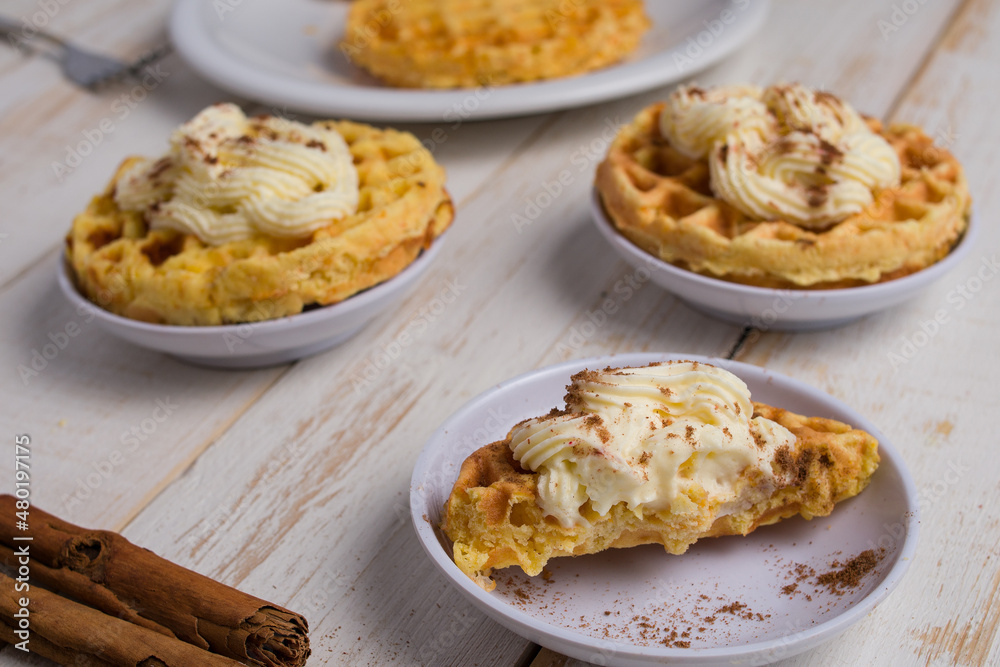 Tasty pumpkin chaffles on table Tasty pumpkin chaffles on table