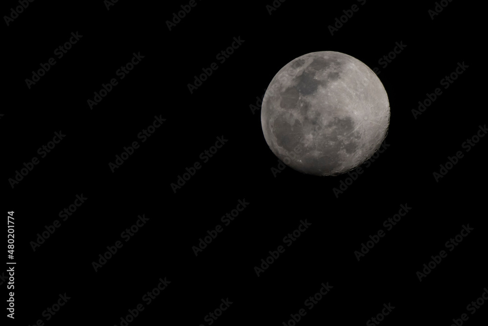 Close up full moon on the Black sky in before rain storm Close up full moon on the Black sky in before rain storm