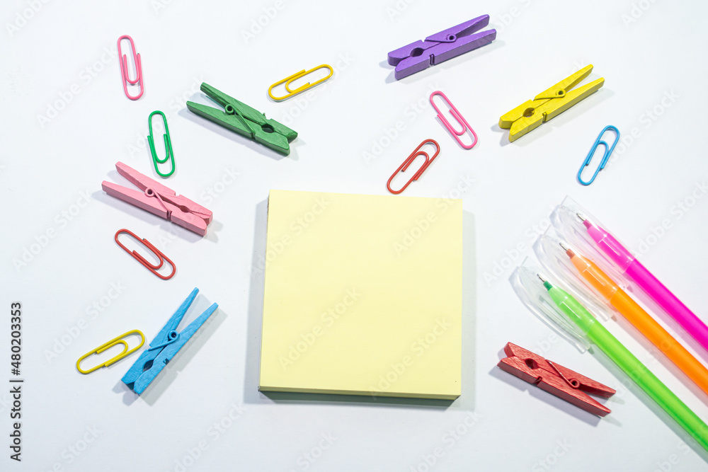 Set of colorful paper clips with white copy space background.business creativity concepts.Flat lay design Set of colorful paper clips with white copy space background.business creativity concepts.Flat lay design