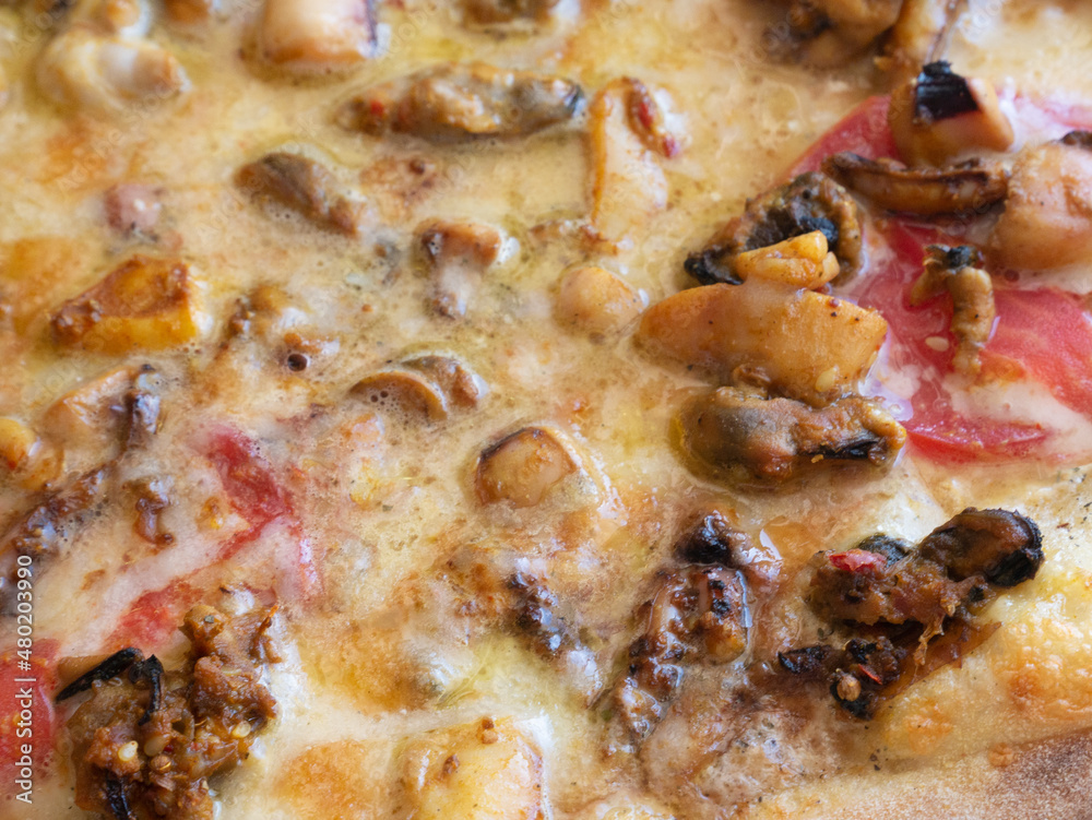 Seafood pizza as a background. Junk food. Seafood pizza as a background. Junk food.