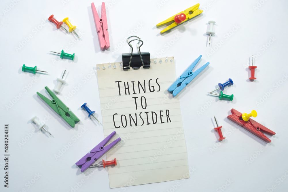 Text sign showing Things to Consider with copy space, stationery items in white background Text sign showing Things to Consider with copy space, stationery items in white background
