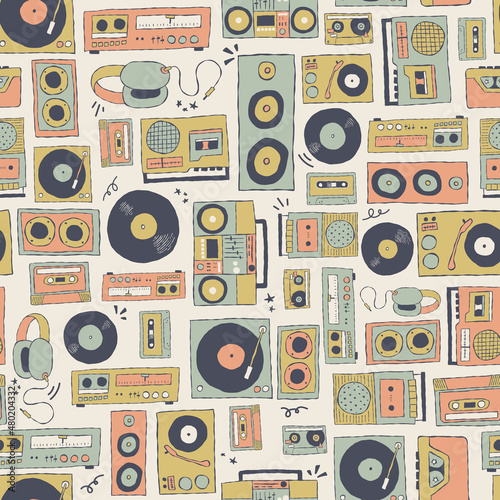 Vector retro music players and technology seamless repeat pattern background. Perfect for fabric, wallpaper, wrapping paper, scrapbooking projects.