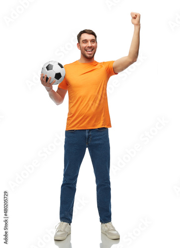 sport, leisure games and people concept - happy smiling man or football fan with soccer ball over white background © Syda Productions