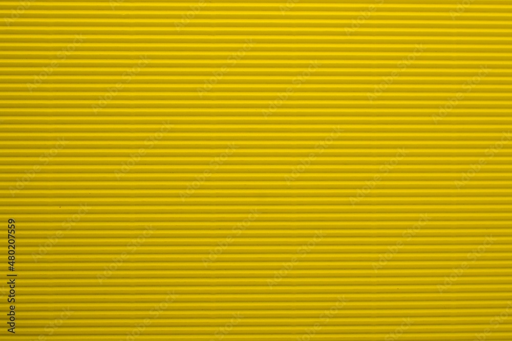 Deep yellow scalloped paper background Deep yellow scalloped paper background