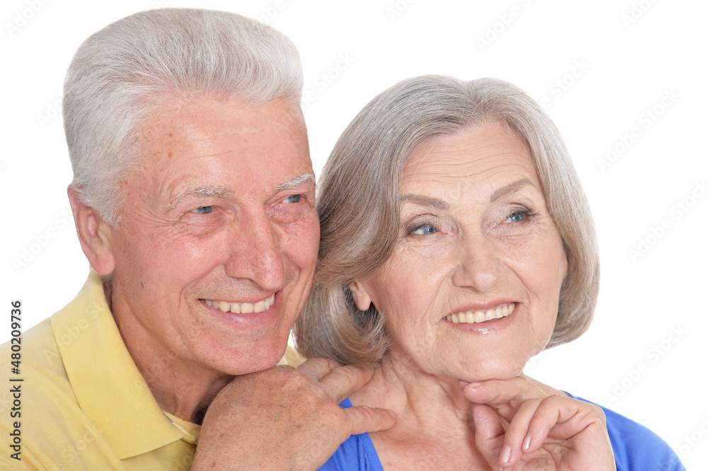 happy beautiful senior couple huging and posing on white background happy beautiful senior couple huging and posing on white background