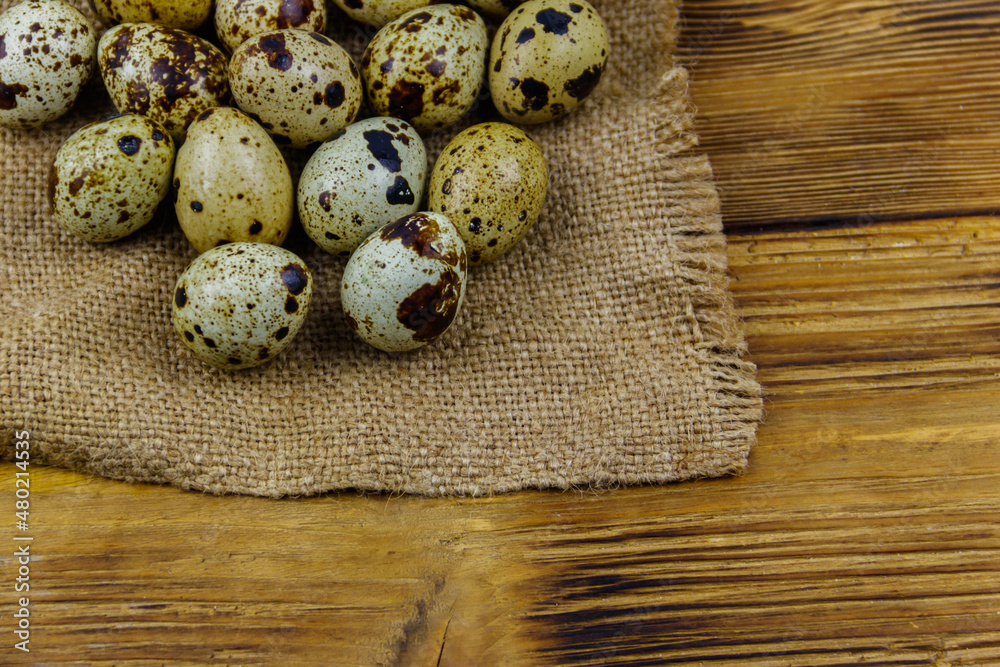 Quail eggs on a wooden table Quail eggs on a wooden table
