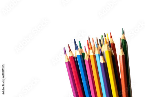 blunt colour pencils are arranged in the line on the white background and ready to paint.