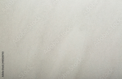 Background Stone wall background with abstract spots. Beautiful gray marble texture with stains, abstract surface background. Finishing stone for building cladding. Furniture granite.