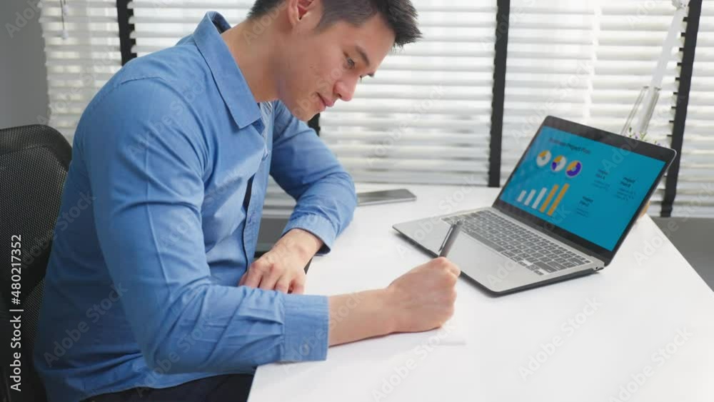 Asian businessman use laptop computer analysing marketing in business. Asian businessman use laptop computer analysing marketing in business.