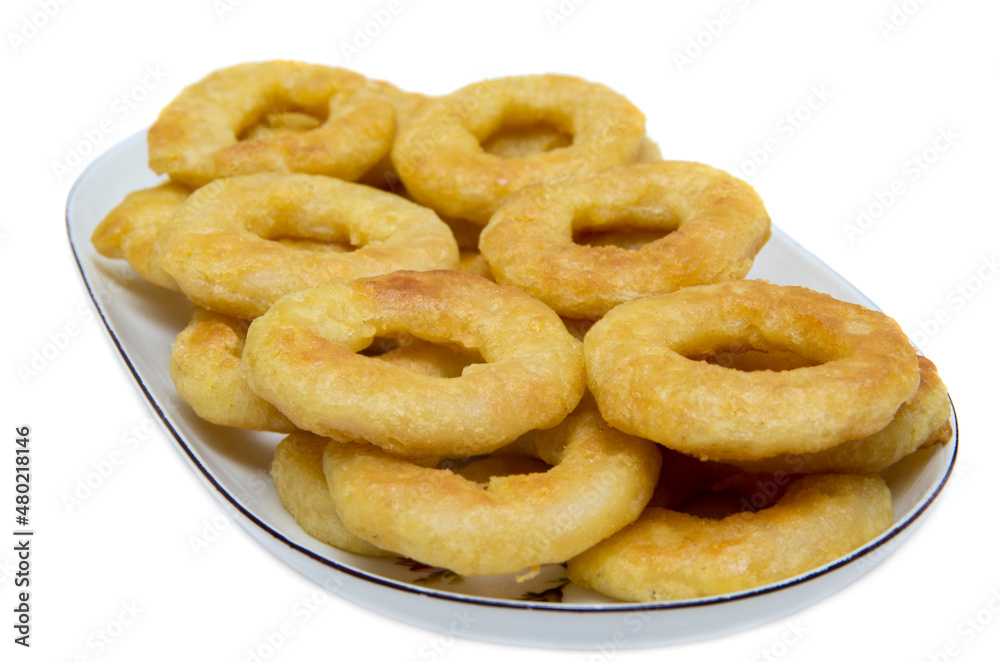 Fried calamari rings on plate isolated on white background Fried calamari rings on plate isolated on white background
