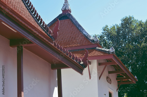 View of the beautiful wooden gable inside compound of church, Wat Buppharam, Trat, Thailand. Selective focus. photo