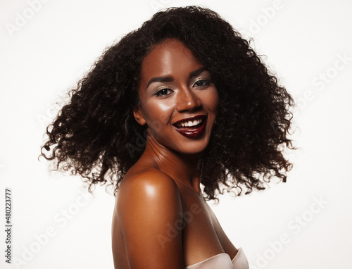 Fashion and beauty concept: attractive african american woman closeup portrait