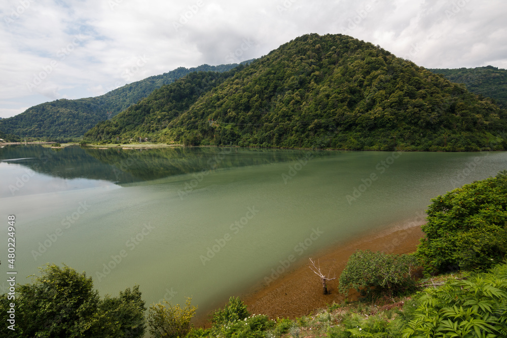 Lake surrounded by mountains. Caucasus mountains.