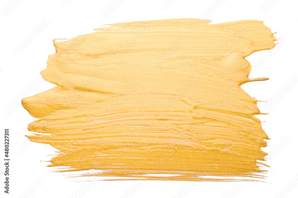 Strokes of golden paint brush close up isolated on white background