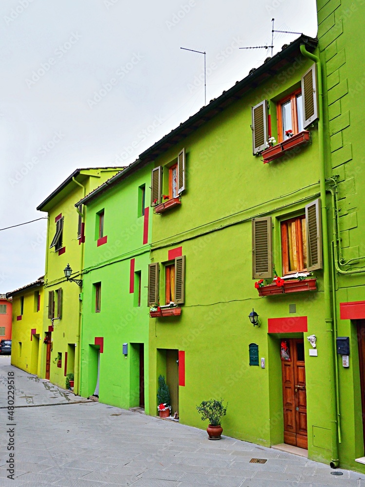 cityscape of Ghizzano, a small colorful village in the municipality of Peccioli in Pisa, Tuscany, Italy