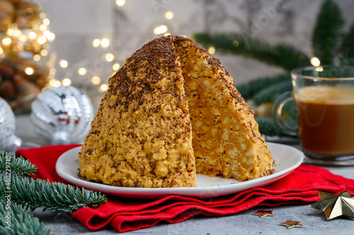 Сake Anthill made of shortbread cookies and condensed milk with butter. Christmas new year dessert. Selective focus  photo