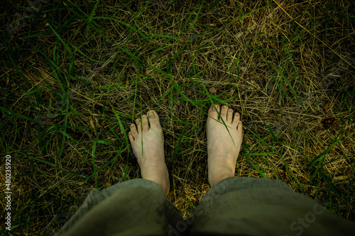 feet in grass