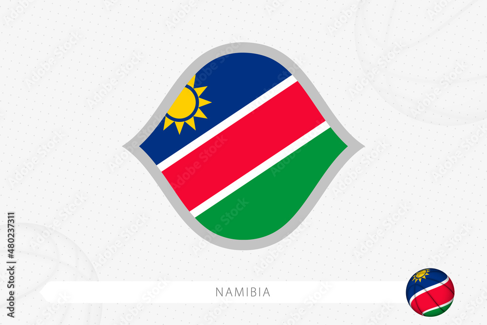 Namibia flag for basketball competition on gray basketball background. Namibia flag for basketball competition on gray basketball background.