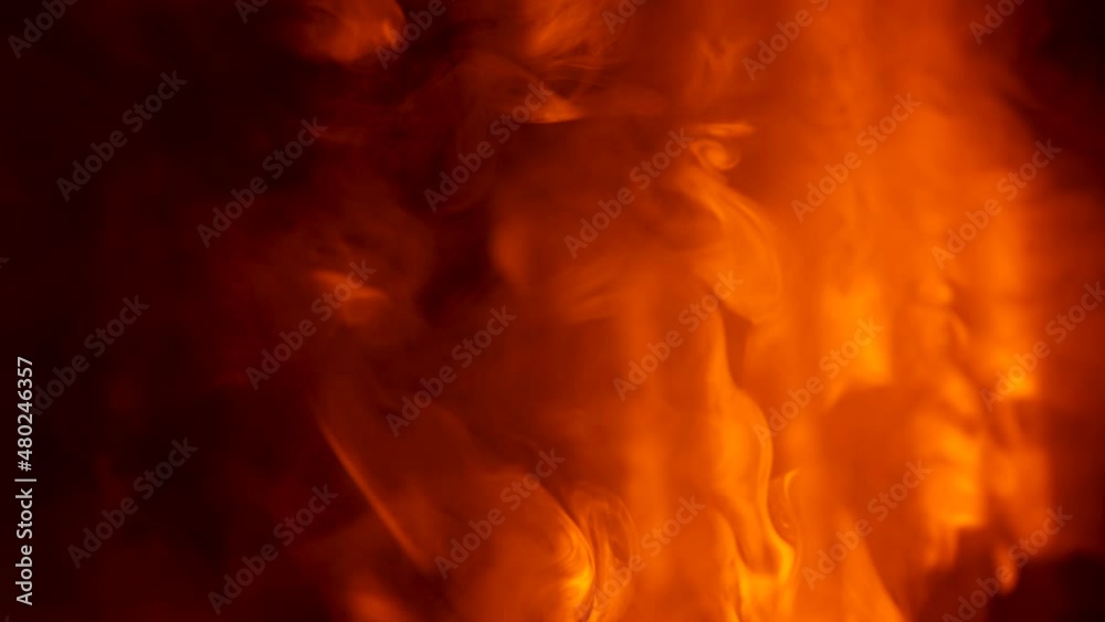 Cloud of smoke hovers and moves against background of dark empty studio in the rays of yellow red lighting stage lights. Colorful lighting effects on smoky dark nightclub stage. Close up. Slow motion. Cloud of smoke hovers and moves against background of dark empty studio in the rays of yellow red lighting stage lights. Colorful lighting effects on smoky dark nightclub stage. Close up. Slow motion.