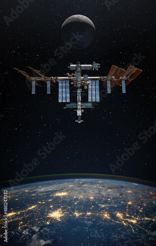 Fototapeta Naklejka Na Ścianę i Meble -  The International Space Station orbiting planet Earth and moon. Scientific space exploration using a space station. Elements of this image furnished by NASA.