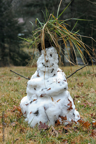 Snowman with Wild Grass Hair Happily Melts Alone in a Snowless Field