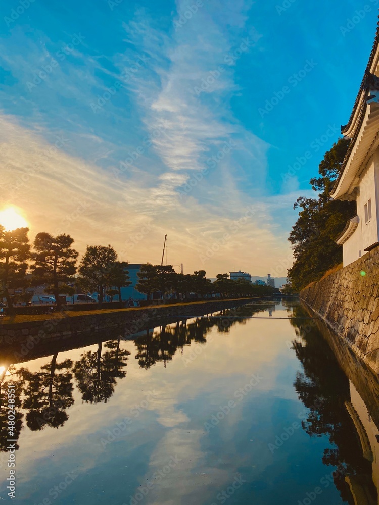 sunset by the river in kyoto, japan