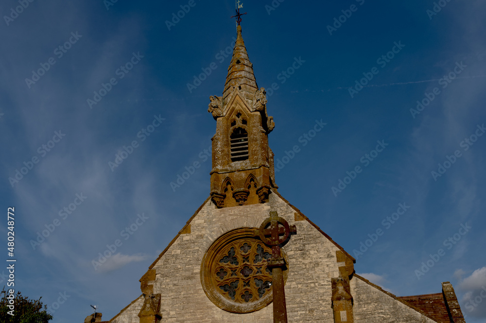 church tower under blue skies