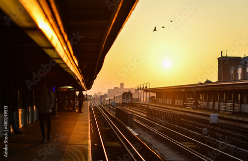 train station during stuning sunrise. photo