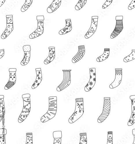 Christmas and New Year seamless pattern of socks outlines. Cool illustrations for wrapping paper, cards, textiles