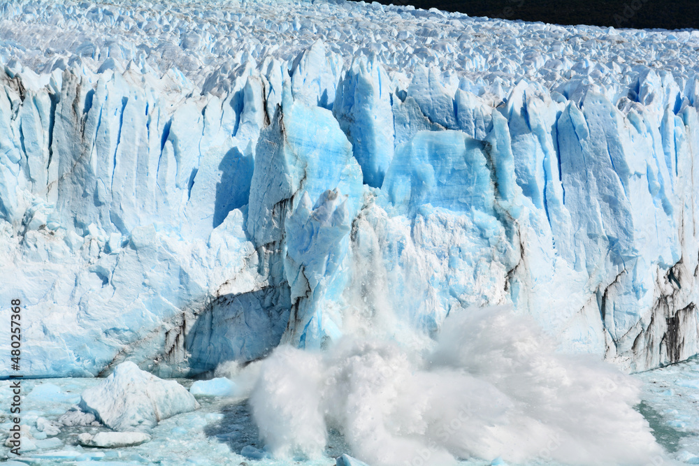  glacier crashing into the water