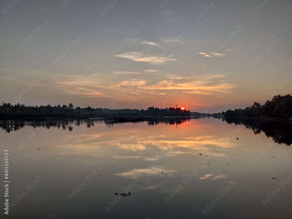 Obraz premium sunset over lake