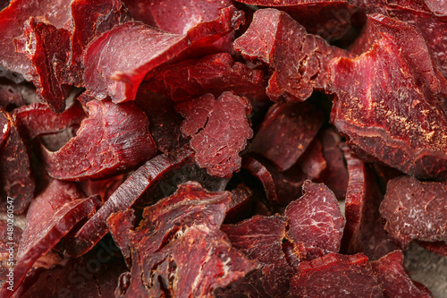 Quadro su tela Spicy beef jerky as background