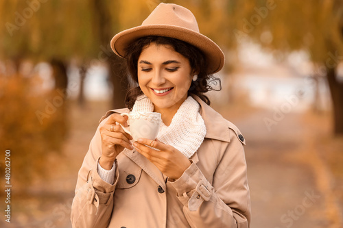 Beautiful woman drinking te...