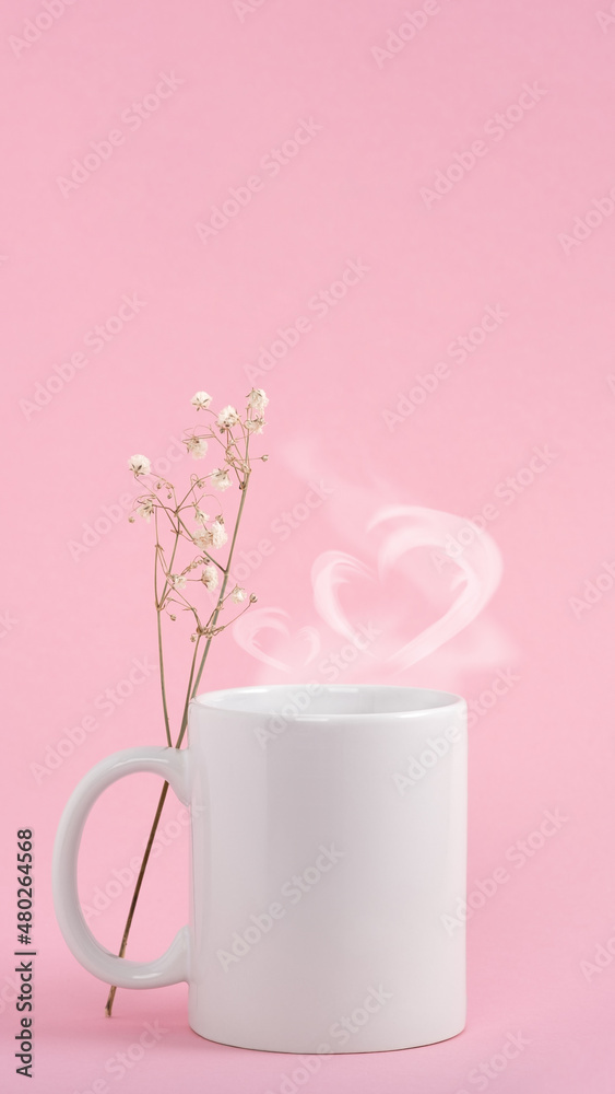 Mockup white coffe cup or mug on a pink background. Hot drink steam in the form of heart