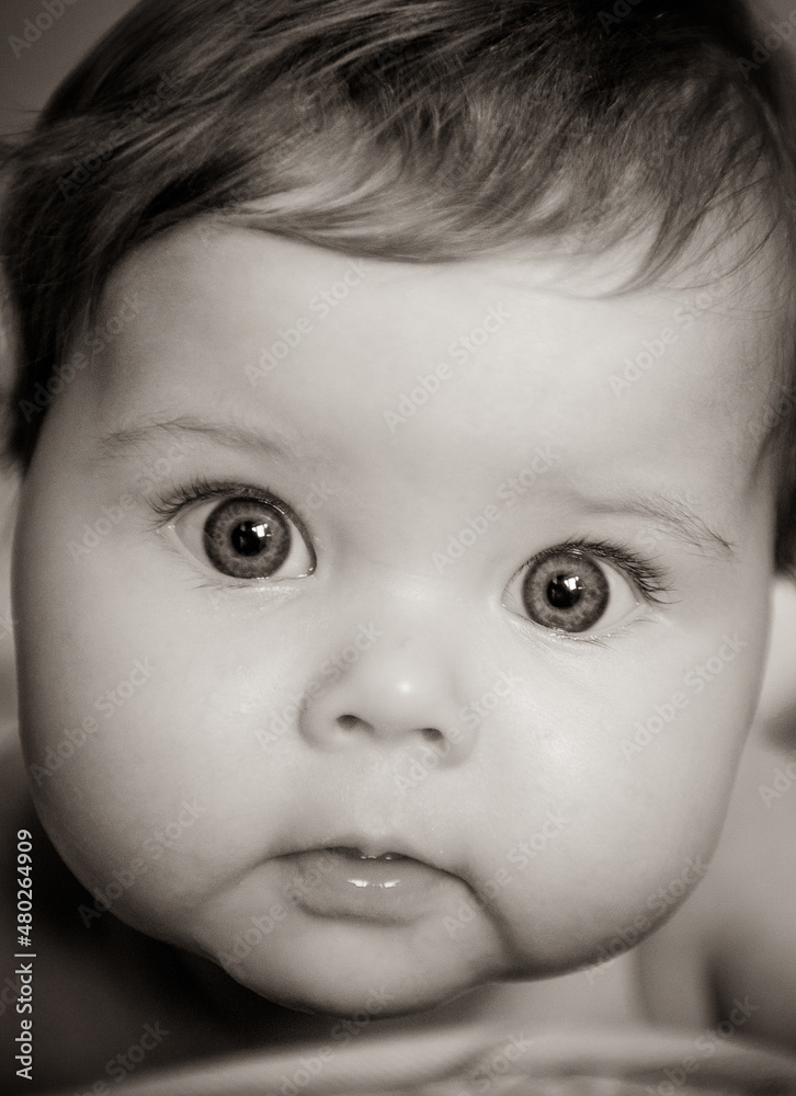 Portrait of cute baby girl with sparkling eyes. High quality photo Portrait of cute baby girl with sparkling eyes. High quality photo