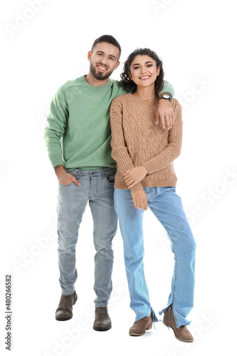 Happy young couple in warm ...