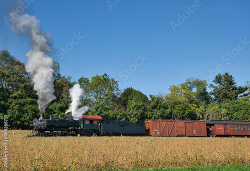 Restored Antique Steam Freight Train Passing Blowing Smoke and Lots of Steam