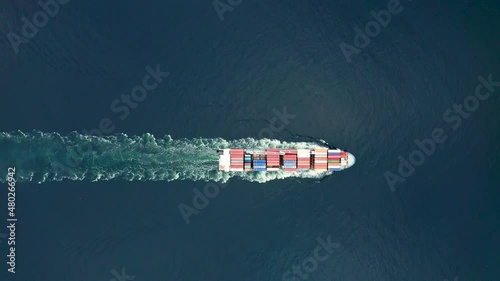 Aerial view of a container ship in the atlantic ocean. Faroe islands.