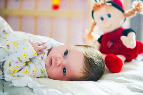 Portrait of cute baby girl with sparkling eyes. High quality photo
