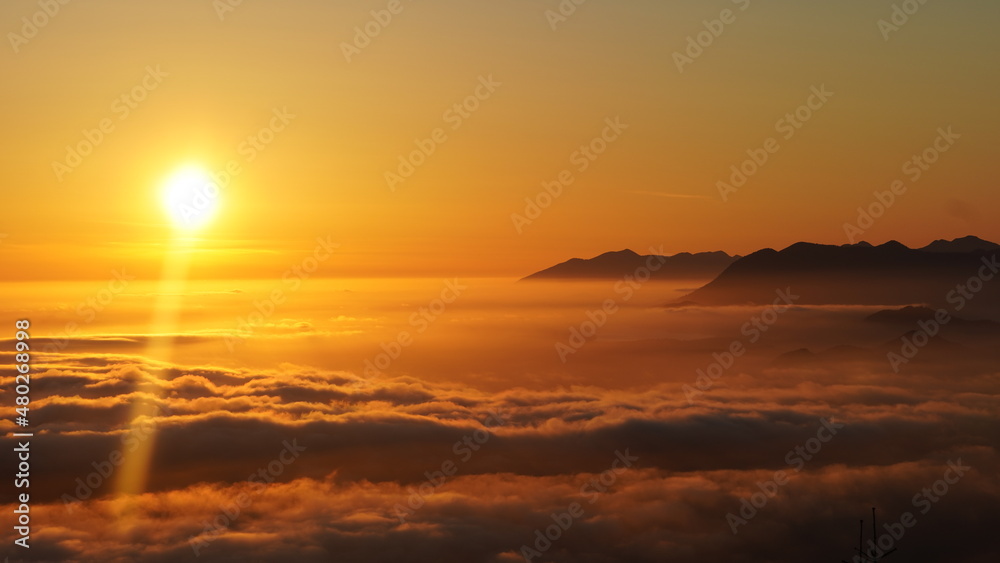 Sunset Above the Clouds 