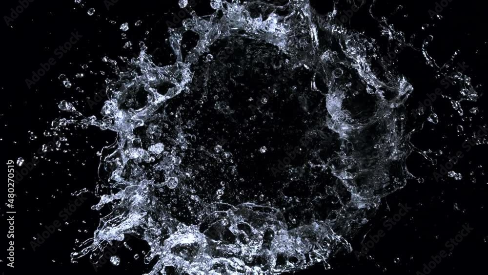 Super Slow Motion Shot of Rotating Water Ring Moving Towards Camera at 1000fps.