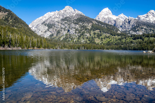 Reflection of the Grand Tetons in Taggart Lake  Jackson Hole  Wyoming