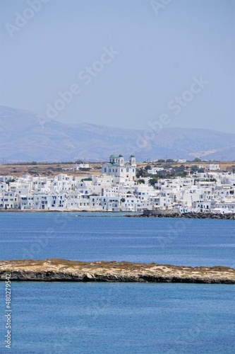 Fototapeta Naklejka Na Ścianę i Meble -  Town with a church located at the Mediterranean Sea in Paros, Greece