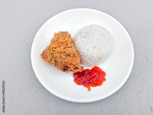 Fried Chicken with Rice on White Plate