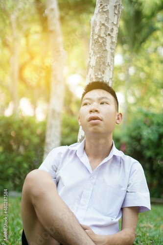 close up cute man in nature garden